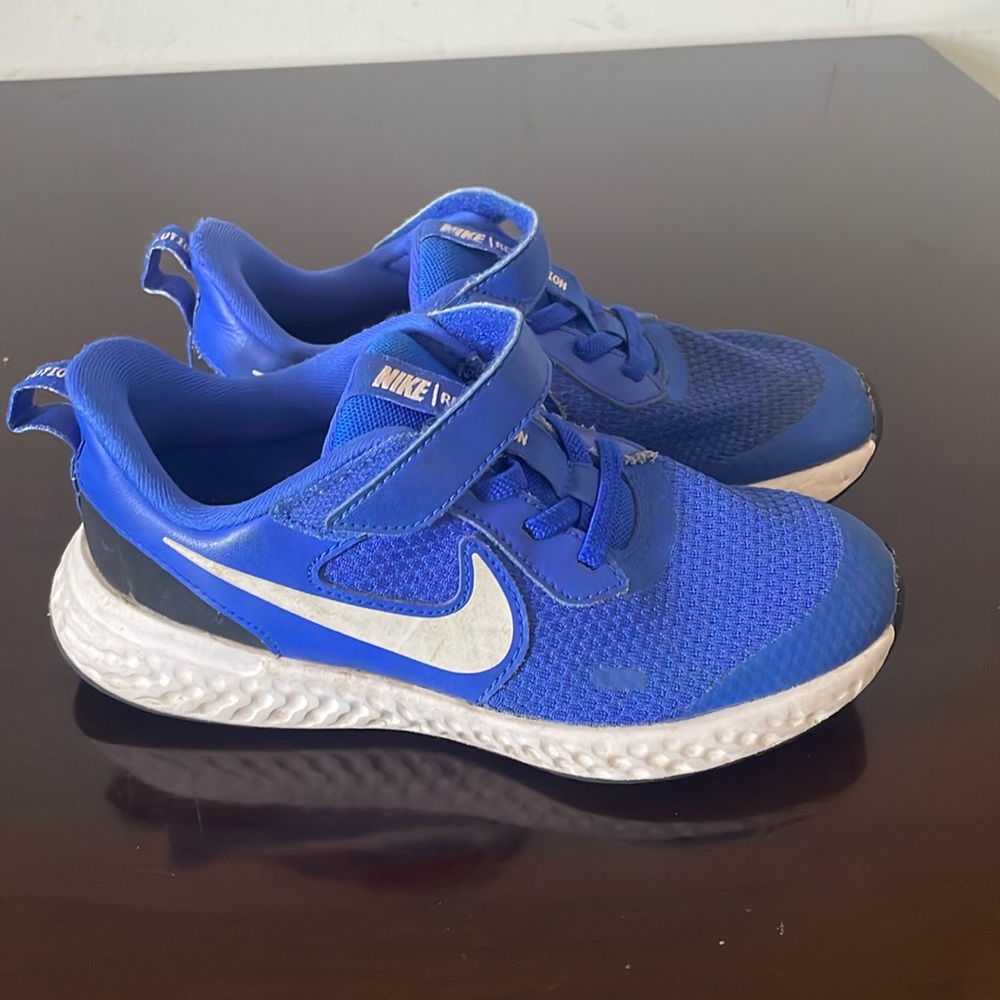 Little Boy's running sneakers in good condition, easy to put on and take off.